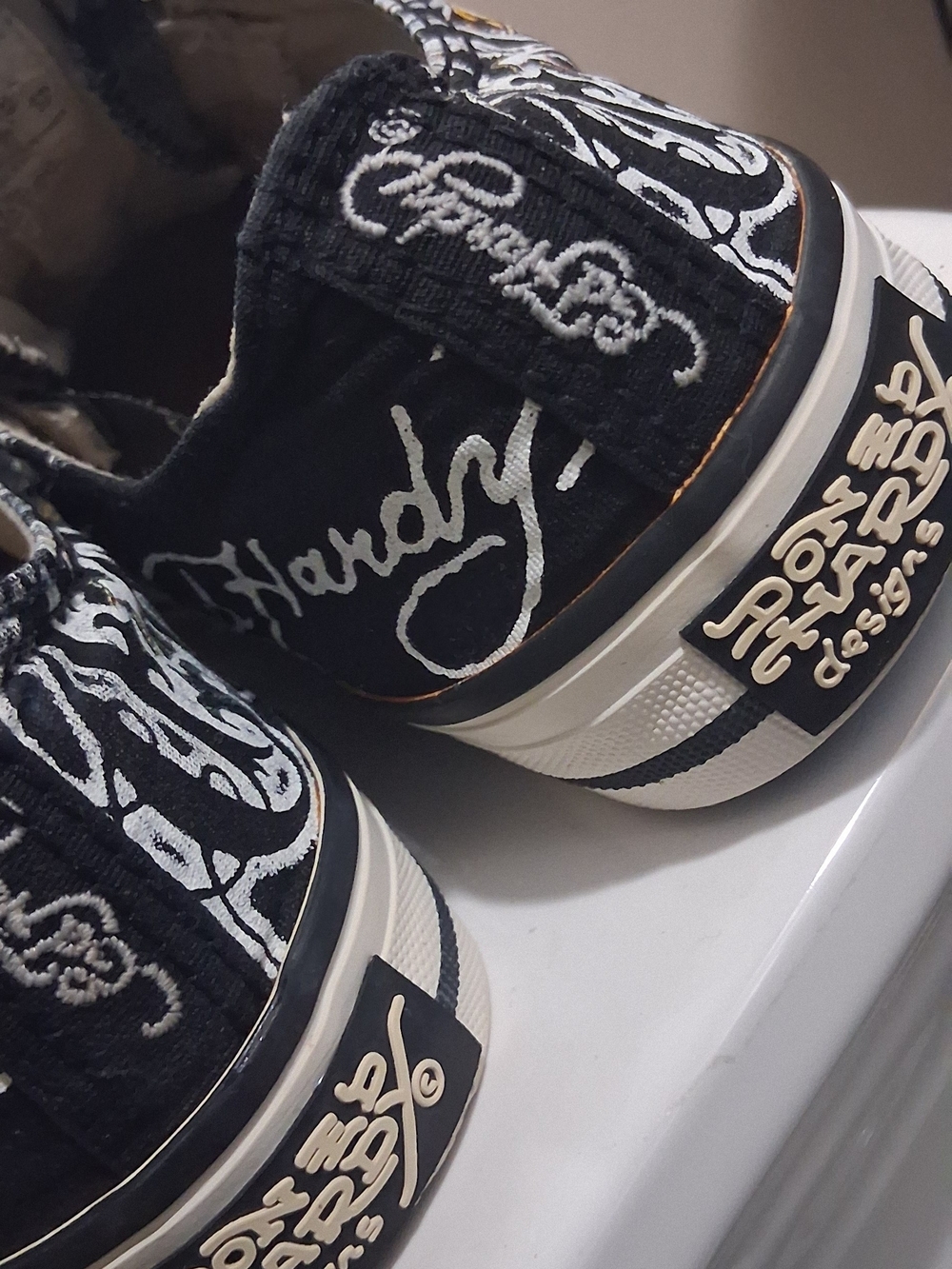 Ed Hardy Men’s Black Graphic Slip-On Sneakers